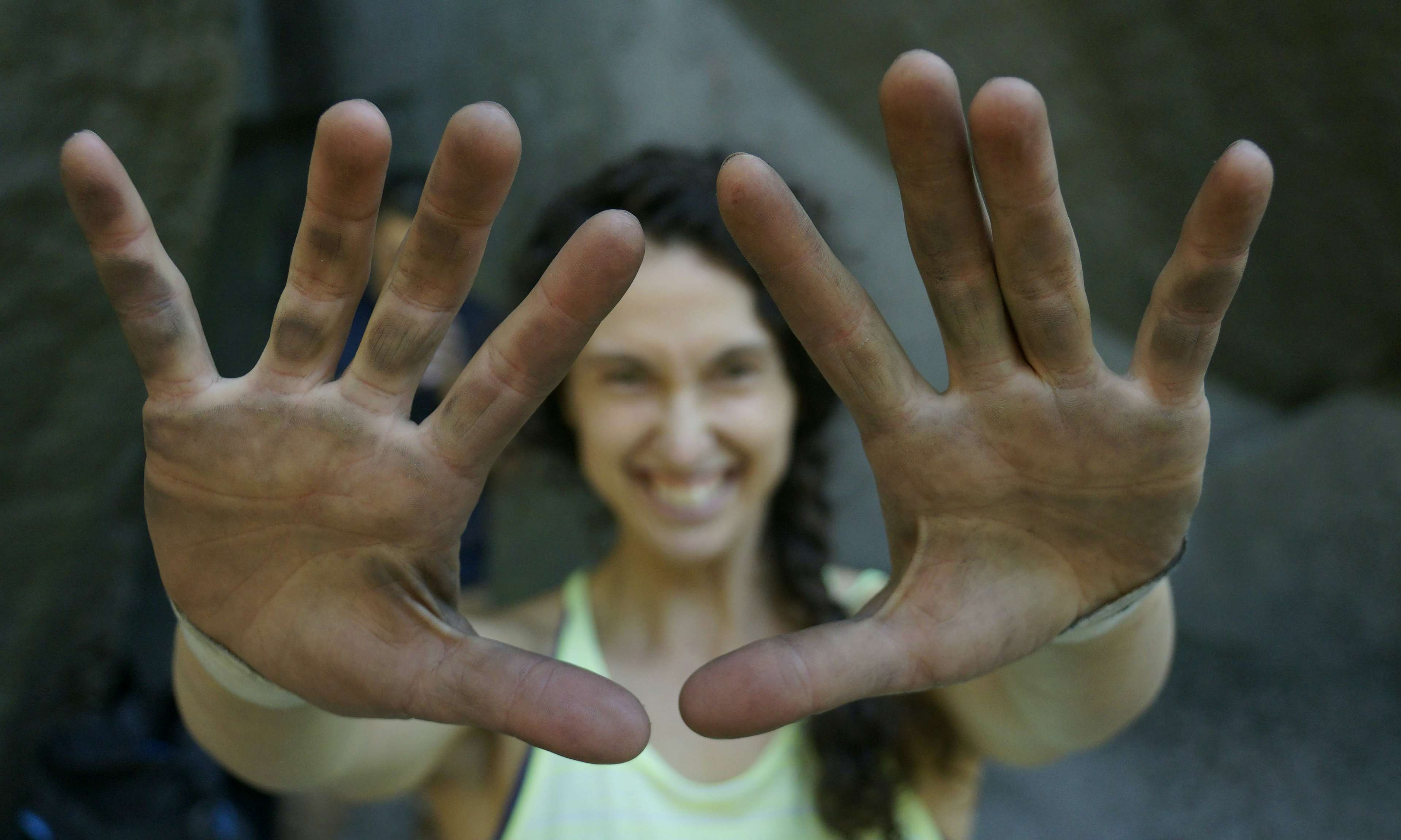 Rock climber showing dirty hands