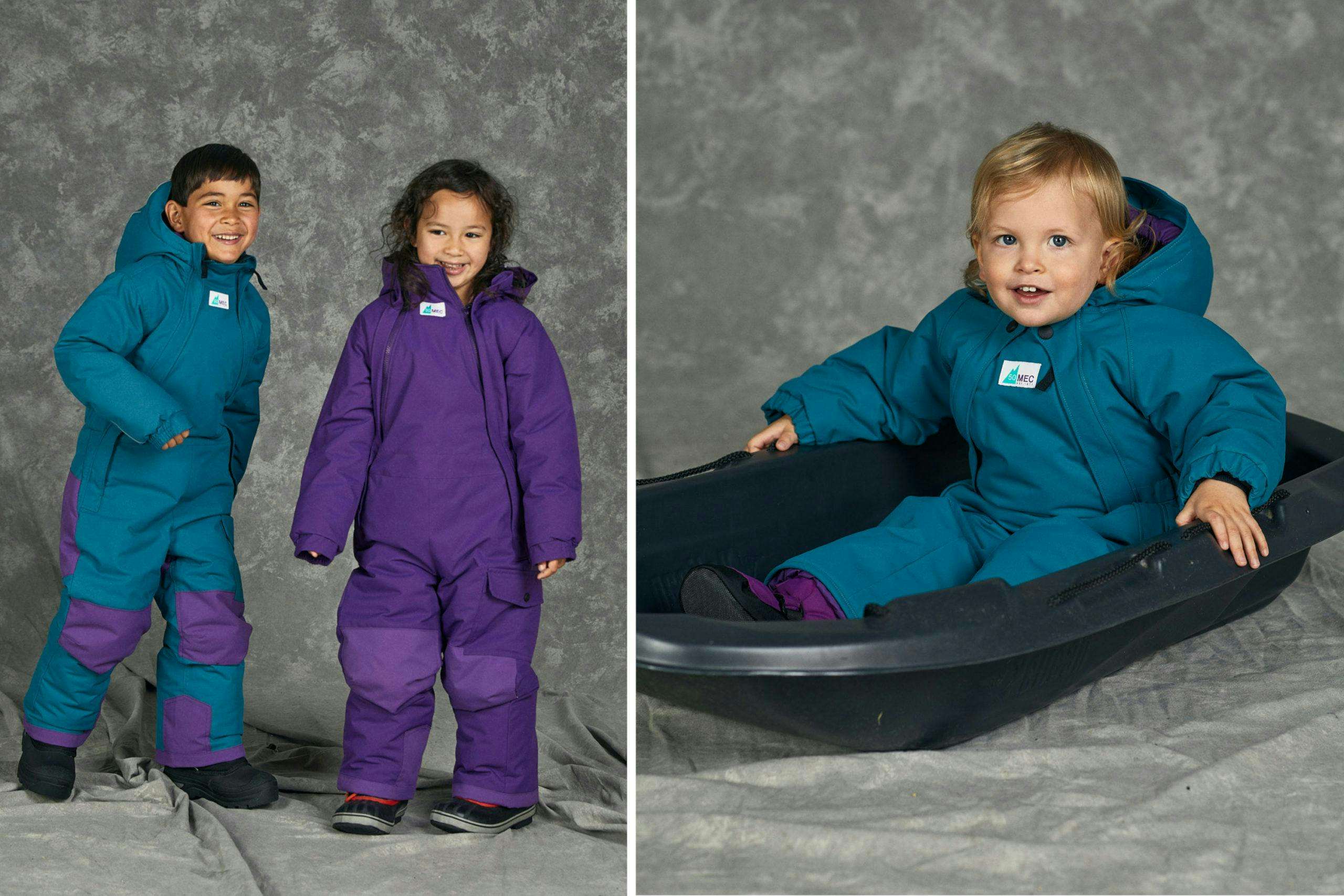 Kids wearing insulated toaster suits in teal and purple