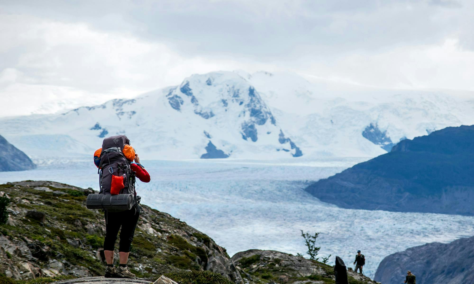 Hiker overlooking the Grey Glacier in the Southern Patagonian Ice Field