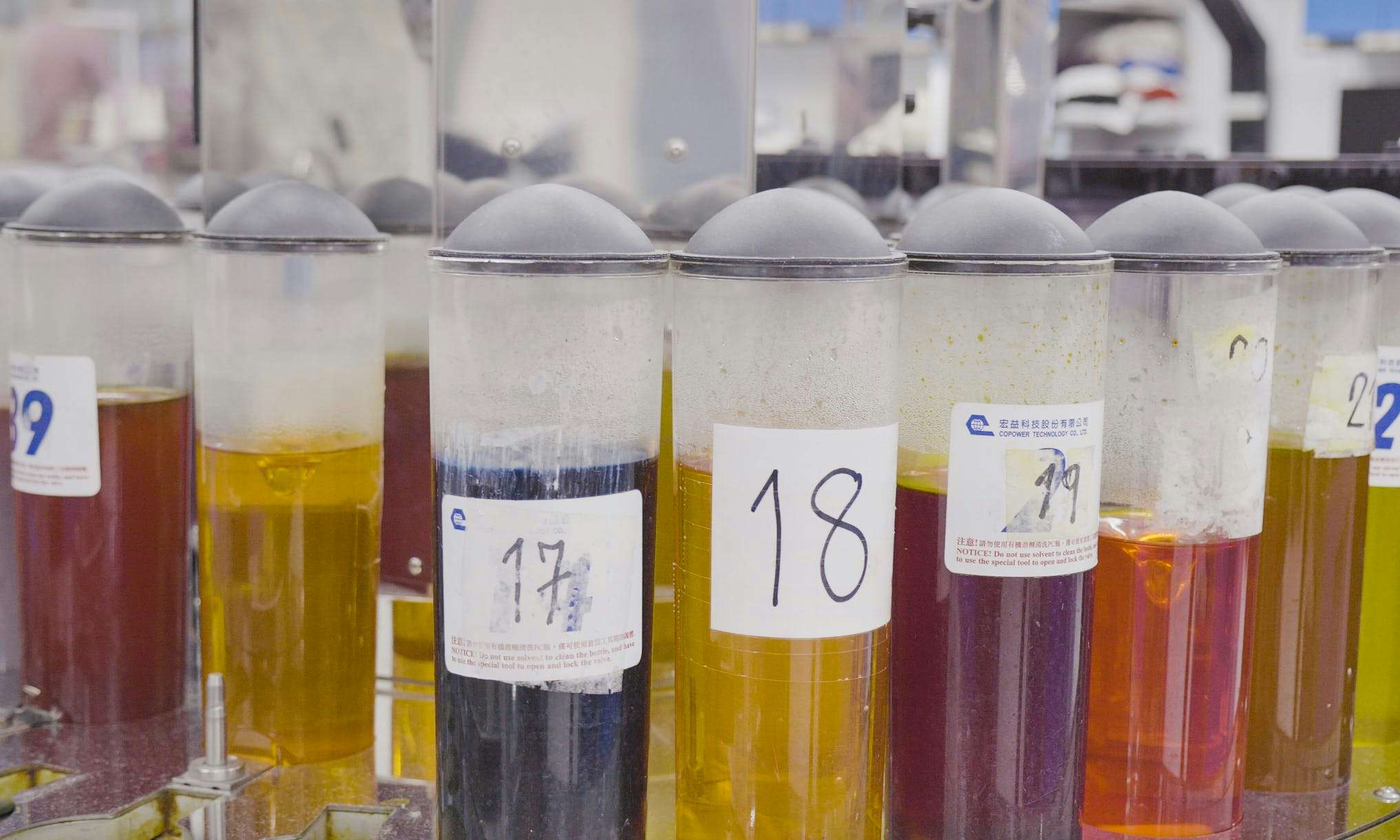 Colourful dyes in clear plastic vials