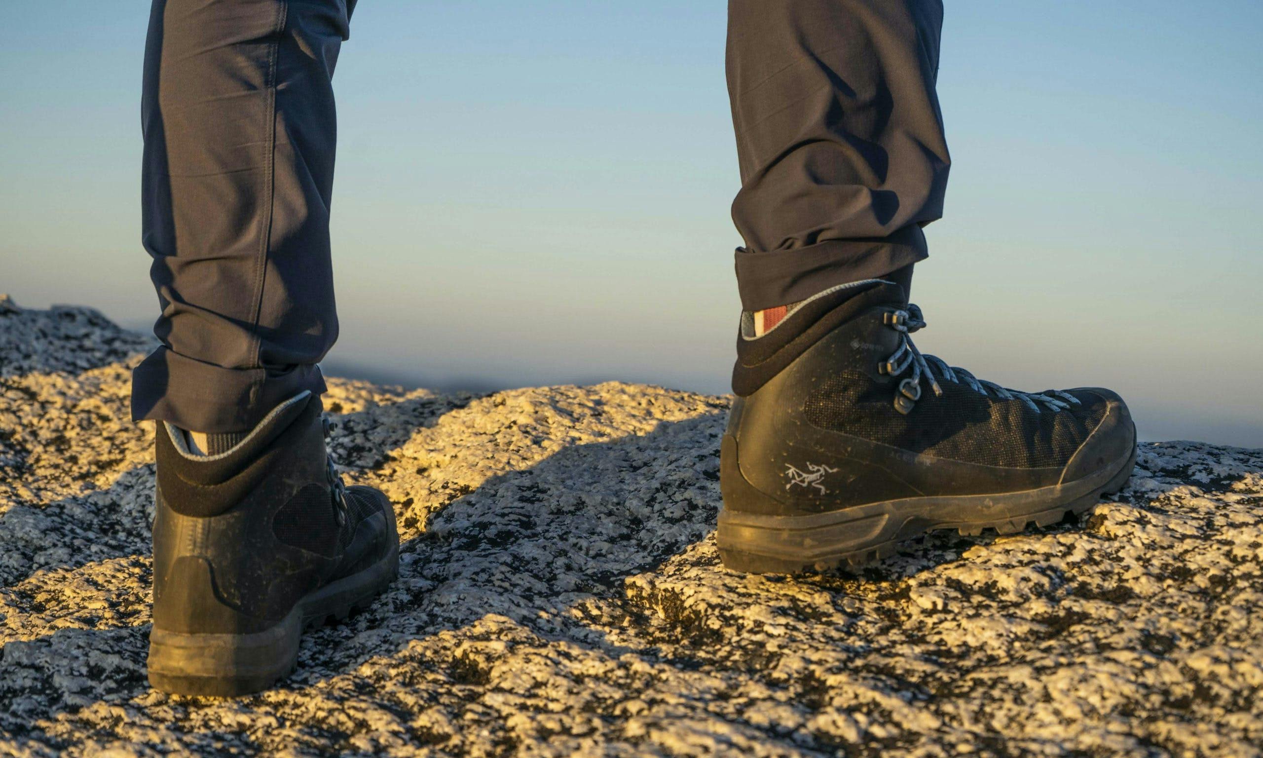 Close up shot of Arc'teryx hiking boots on a rock