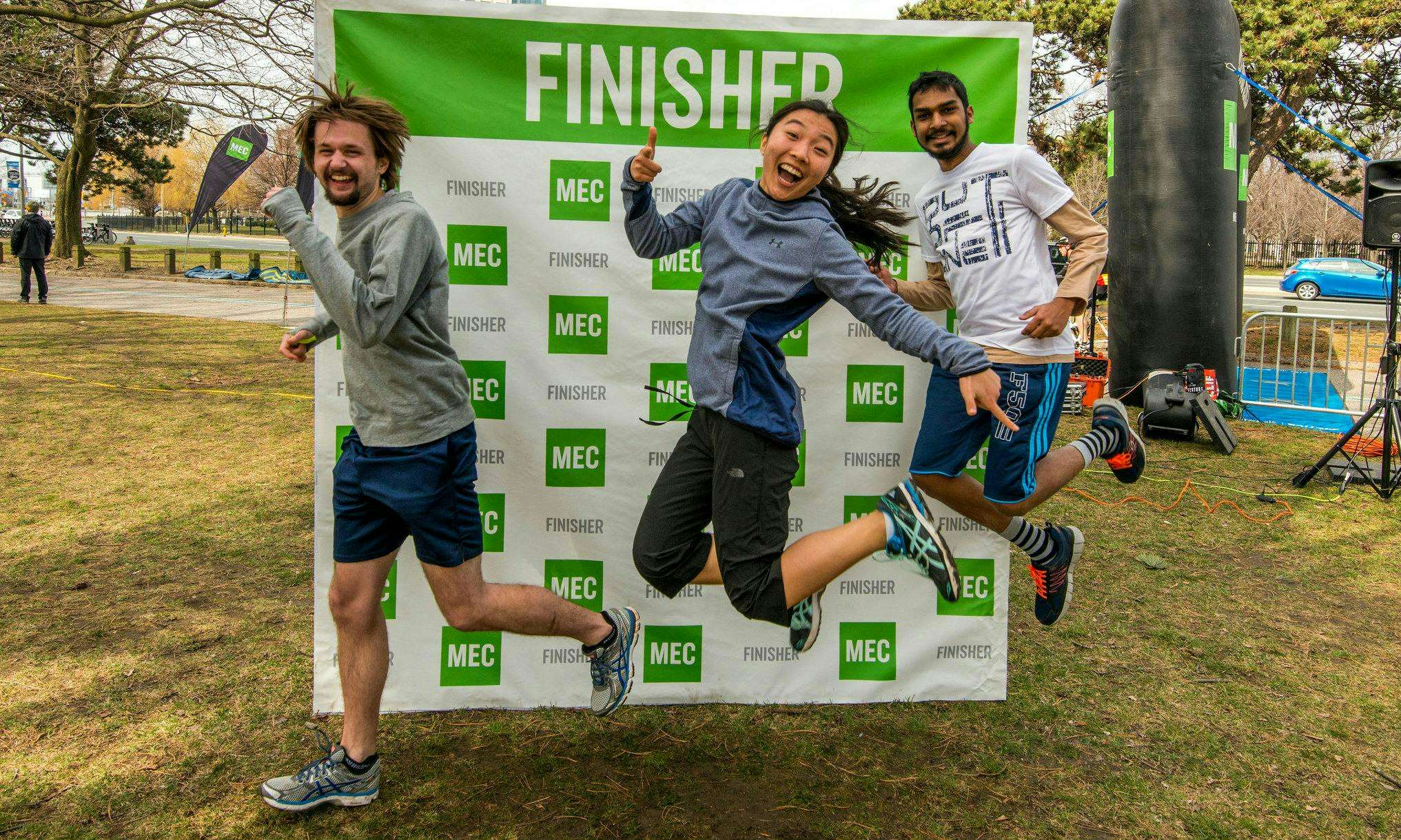 Runners celebrating after an MEC race