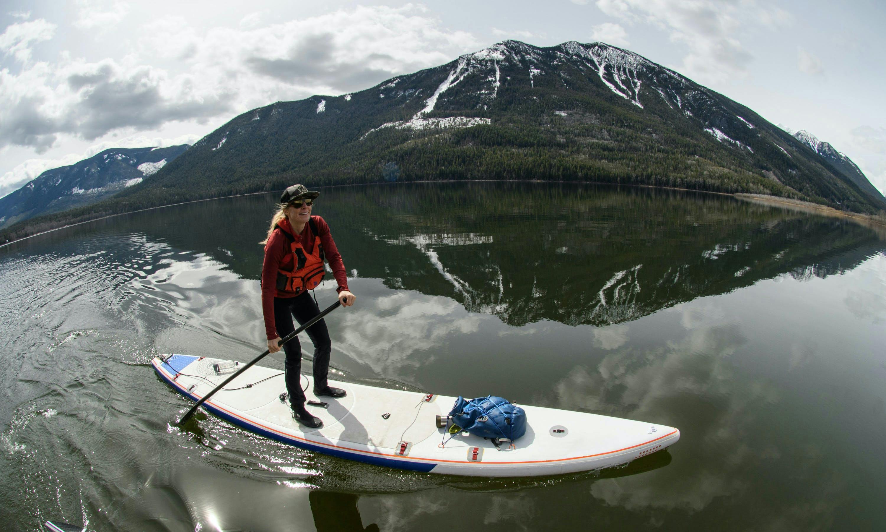 Paddleboarding with a mountain view