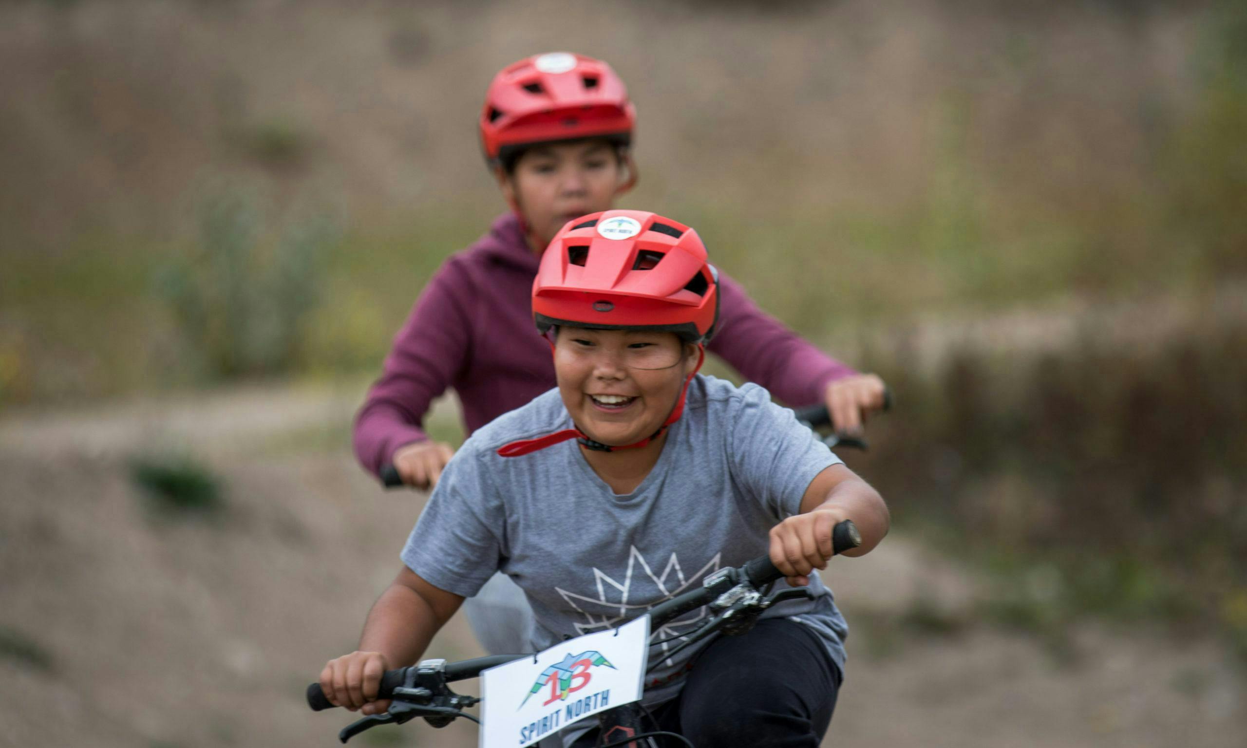 Kids mountain biking and having fun