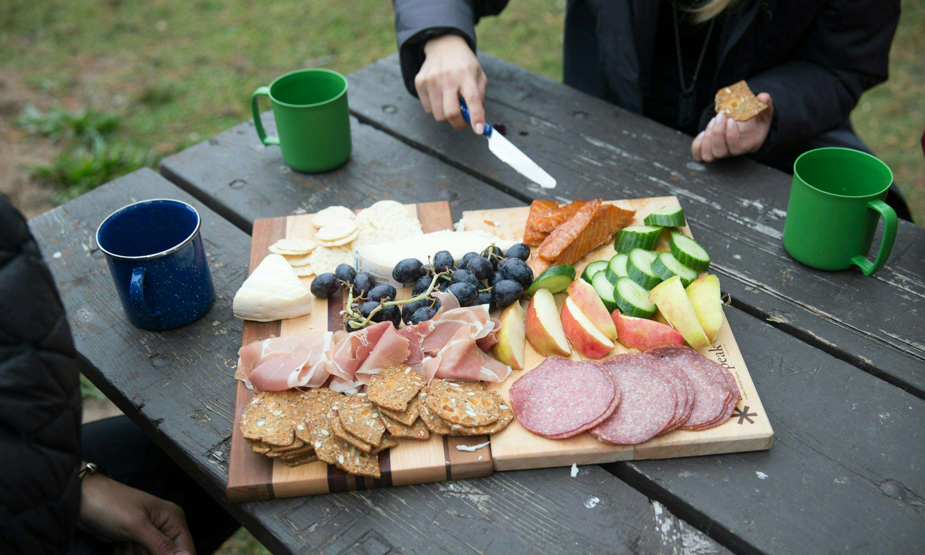 Amazing spread of snacks on a picnic table