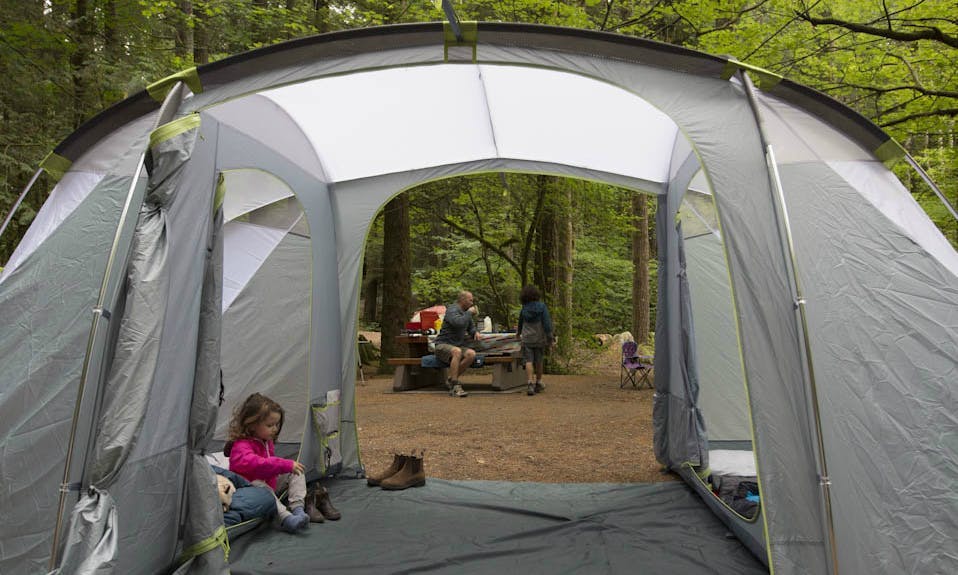 Family camping with a large tent