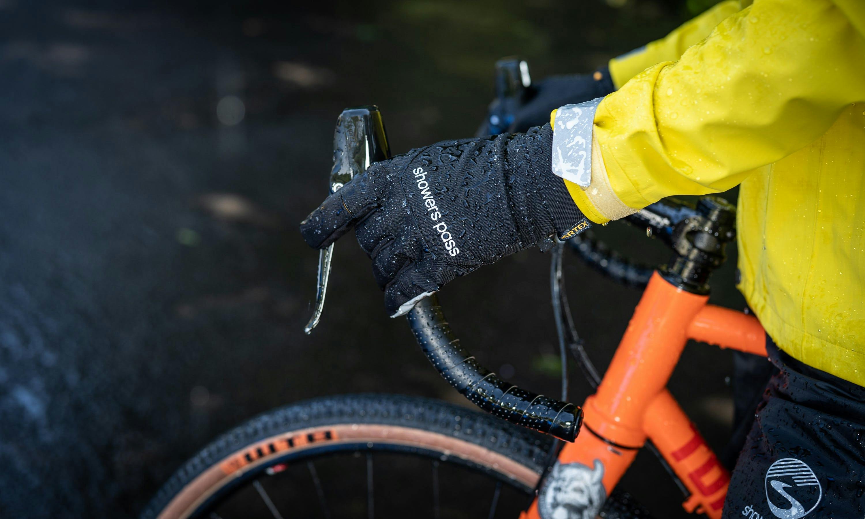 Close up of bike gloves with raindrops on them